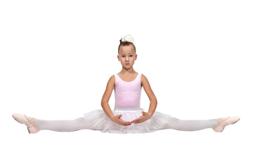 Girl in ballet pose wearing a pink leotard, white tutu, and tights, sitting gracefully
