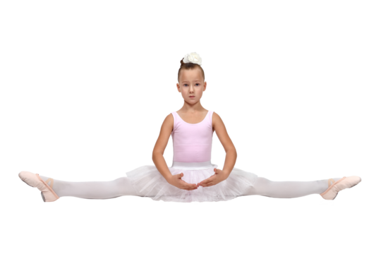 Girl in ballet pose wearing a pink leotard, white tutu, and tights, sitting gracefully