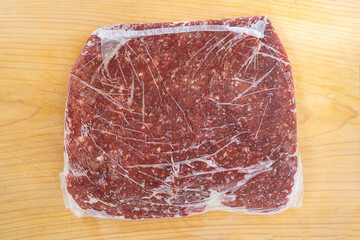 Packaged and Frozen ground meat.