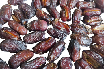 Realistic dried dates with wrinkled texture—transparent PNG for food design, packaging, and education.