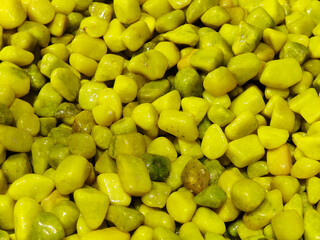 Close-Up of Yellow and Green Decorative Pebbles
