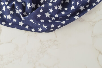 Patriotic Fabric Draped On A White Marble Background With Copy Space