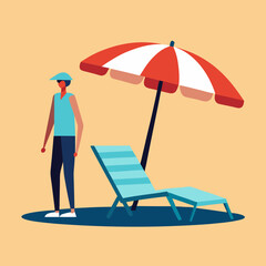 Man standing on beach next to lounge chair and umbrella on a sunny day