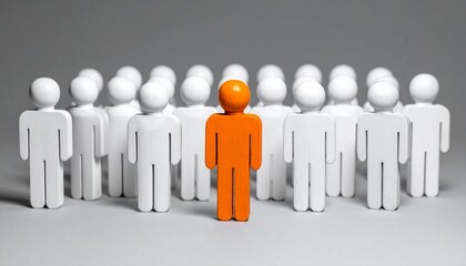 Orange figure stands apart from white group on neutral gray background.