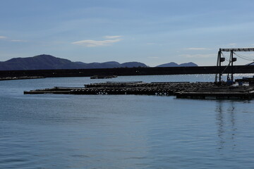 Fishing Village's Boats and the Sea's Voice. Though I see no fish's shadow, I imagine it and sing.