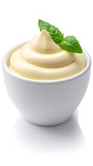 Creamy Mayonnaise Swirl with Basil Leaf in White Bowl.