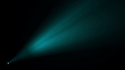 Emerging teal beam of light cutting through darkness with grainy textures and visible starburst