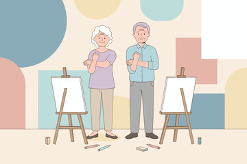Happy senior couple ready to paint in an art class Engaging hobby for older adults