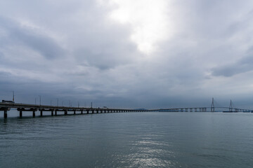 Fototapeta premium idyllic seascape with a long highway bridge