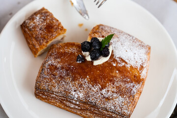 blueberry pie on a white ceramic dish