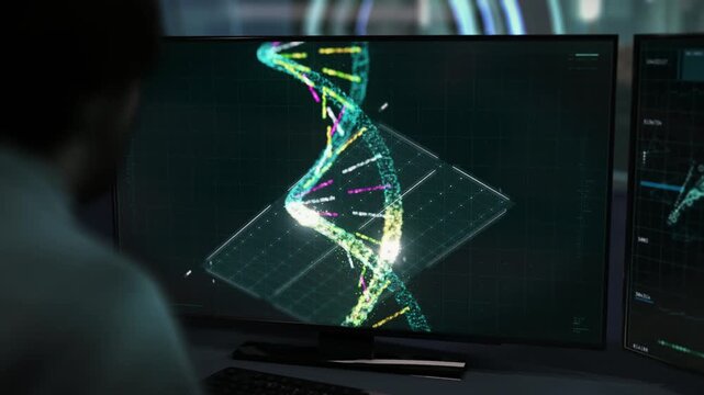 Coronavirus DNA Analysis software on the computer screen. A doctor is Supervising the coronavirus DNA Analysis process. Coronavirus DNA Analysis is scanning through the strands of the genetic code.
