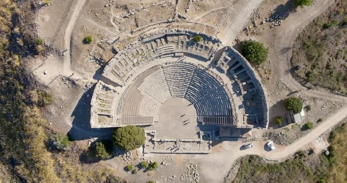 Aerial zenithal view of the Segesta Theater. These are the ruins of a Greek theatre located in the archaeological area of ​​Calatafimi-Segesta, in the province of Trapani, Sicily, Italy.