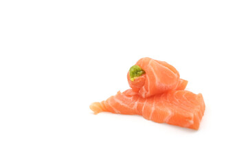 Sashimi made from salmon and wasabi on a white background. Japanese style food.