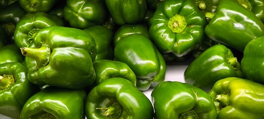 Green bell peppers in a fresh vegetable shop