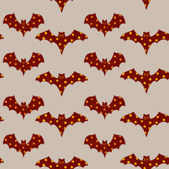 Cartoon funny black bats with orange speckles on gray wallpaper. A festive Halloween folk pattern with traditional illustration elements.