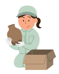 生前整理・片付けをする3/作業員の女性1