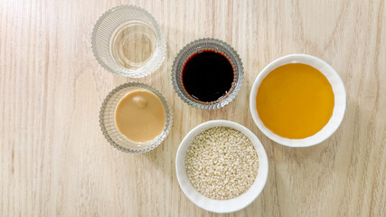 Eclectic bowls of sesame, soy, umami symphony conjuring Global Belly Laugh Day's culinary humor and traditions