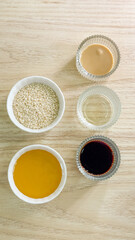 Amber-hued elixirs with sesame whispers, evoking Lunar New Year flavors, culinary alchemy, and ancestral kitchen tales