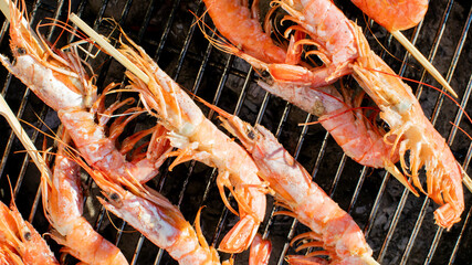 Grilled prawns sizzling under summer skies, evoking seaside traditions, Tingyuan Festival, and...