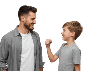 Joyful father and son bonding, playfully engaging in a fist bump against a transparent backdrop