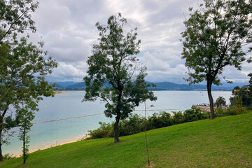 Wonderful view of the calm sea from the promenade in Santander, Spain, with soft waves and a peaceful coastal atmosphere.