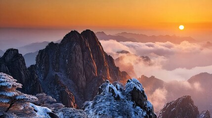 Snow-Capped Mountain Peaks Rising Above a Sea of Clouds at Sunrise