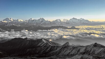 A breathtaking view of snow-capped mountain peaks rising above a sea of clouds at dawn, showcasing the majestic beauty of high-altitude landscapes.