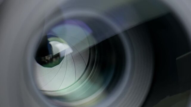 Controlling aperture and depth of field in camera lens