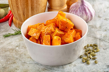 Vegan cuisine - baked pumpkin with herbs