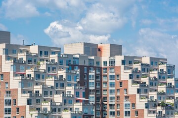 Cityscape Layers: An impressive multi-layered architecture showcases contemporary design against a...