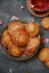 Homemade Chiroti/Chirote - In deep fried Diwali sweets, selective focus