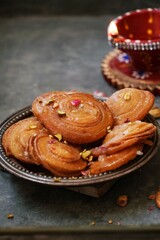 Homemade Chiroti/Chirote - In deep fried Diwali sweets, selective focus