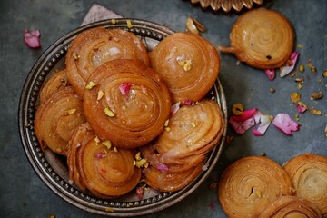 Homemade Chiroti/Chirote - In deep fried Diwali sweets, selective focus