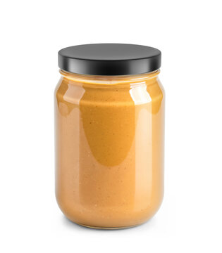 Clear Glass Jar Filled with Peanut Butter and with a matte cap on a transparent background.