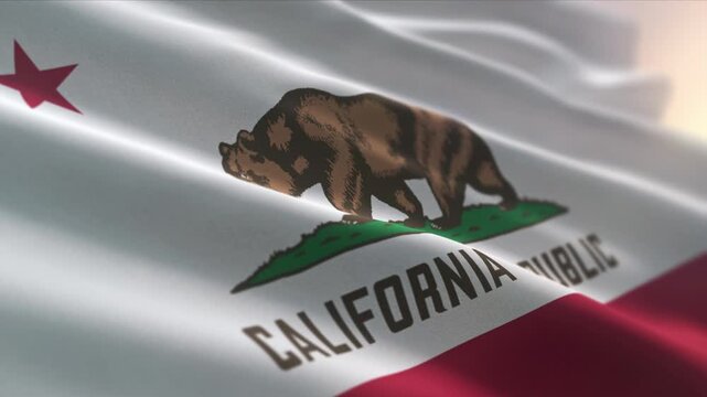 Fluttering the USA flag of the California state. Grizzly Bear depicted walking on a patch of green grass on the USA state flag. USA state flag with a red stripe at the bottom. Patriotic