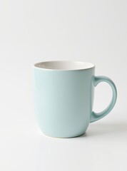 Light blue ceramic coffee mug with handle on white background, minimalistic design with copy-space