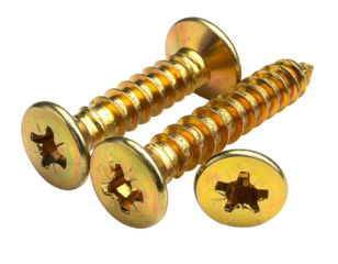 Three gold-colored screws with Phillips head, sharp tip, on black background