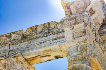 Ancient Stone Architecture Showcasing Intricate Details and Carvings in a Clear Sky Background
