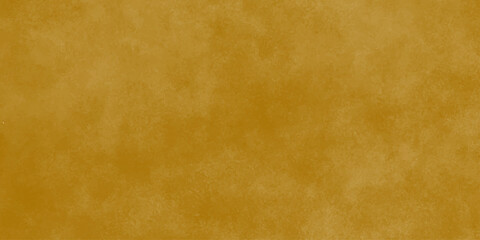 Yellow brown stained paper. Old retro letter texture. A textured gold background with a soft gradient from yellow to deep amber. brown concrete wall abstract background.
