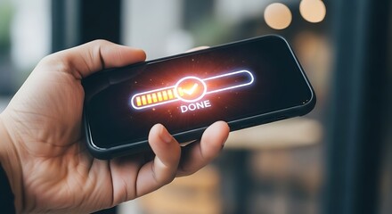 Hand holding smartphone with loading bar and done message on screen, representing successful completion, progress, and digital task management in modern technology