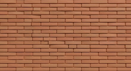 Fototapeta premium Close-up view of a repeating, evenly laid brick wall with a slightly textured surface