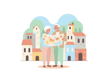 Happy senior couple exploring a charming European town with a map enjoying retirement travel
