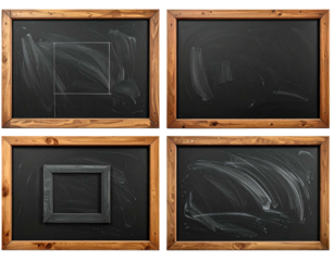 Four wooden framed chalkboards with various chalk smudges and markings