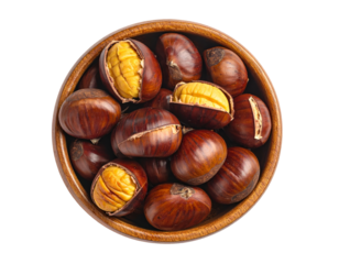 Overhead view of roasted chestnuts, some split open, in a circular wooden bowl