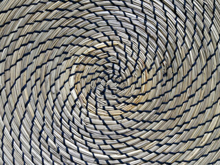 Close up macro abstract pattern of a rough brown nautical rope coil
