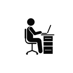 Silhouette of a person sitting at a desk with a laptop, working or studying.