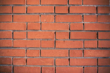 An old red-brown brick wall. Texture Background.