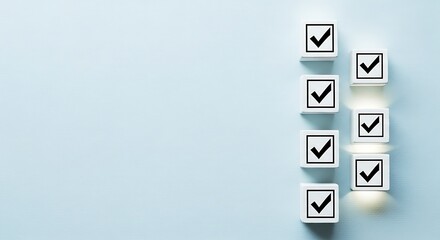 Checklist with checkmarks on wooden blocks, symbolizing completion and success against a light blue background