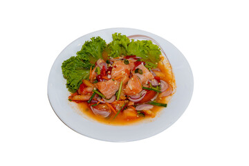 Thai spicy salmon salad served on a white plate with lettuce. Fresh salmon mixed with Thai herbs, chili, lime juice, onion, and fish sauce. A popular Thai-style spicy seafood dish.