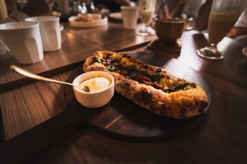 Garlic Bread with Melted Mozzarella Cheese ,Herbs and a cheesy dip